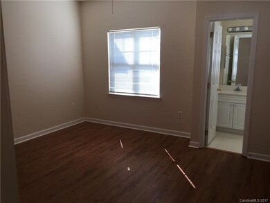 Bedroom 1 features 2 closets and a full bath