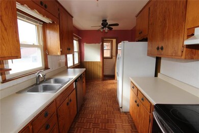 Kitchen with 1/2 bath straight ahead