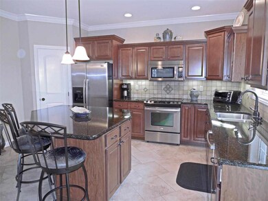 The kitchen with stainless steel appliances will d