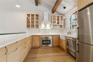 Induction stove, marble countertop, and Duvall Kit