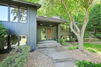 Plush green picturesque backdrop with an open/vacant lot to its west, a park to the NW and massive lot with so much character and use-potential!