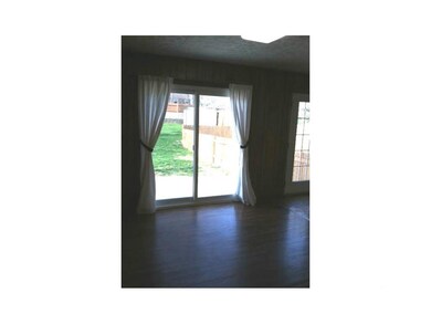 Dining Area. Natural hardwood flooring in the dini