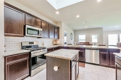 Luxury cabinets and Stainless steel appliances throughout