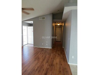 Property Photo. Living room and hallyway