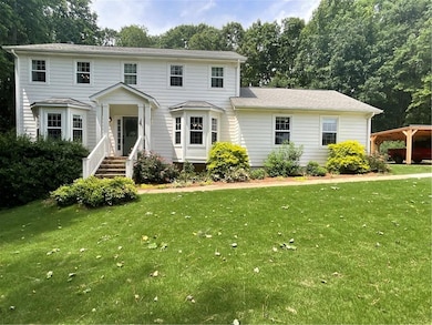 Colonial house with a front lawn