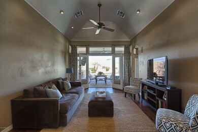 Living w/french doors opening to back pa