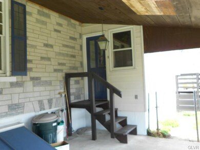 rear porch showing 1 of 4 private entrances.  This