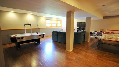 Wood Laminate Floors in the entire finished Baseme
