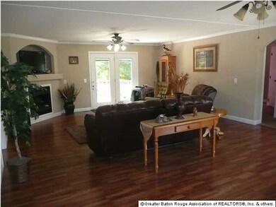 Looking from front of living room to back french d