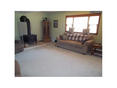 Family Room is HUGE with a woodburner to save on those winter heating bills!