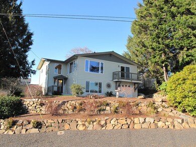 Front of home, complimentary rock work