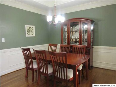 Formal Dining Room with Trey Ceiling, Chair Rail a