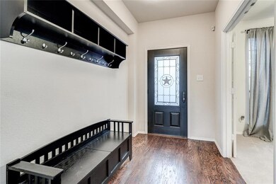Entry with hard wood floors