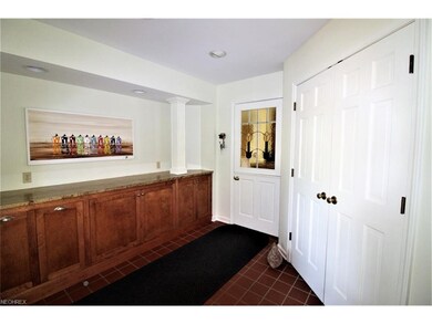 Breezeway Entrance with an Abundance of Storage Ca