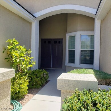 Courtyard entry to front double doors.