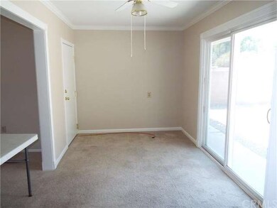 Bonus room with crown moldings and dual pane slide