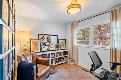 Bright and versatile, this front room—currently used as an office—works beautifully as a guest room, dining room, library, music room and more!
