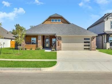 Craftsman-style house featuring an attached garage