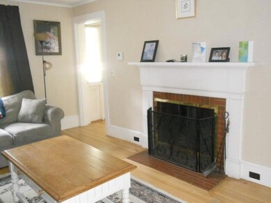 Living room q/fireplace & H/W floors