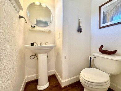 Clean and spacious half-bath located just as you e