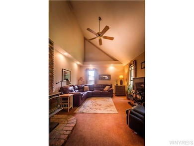 Living Room. Note airtight woodburning stove for e