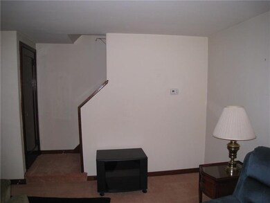 The stairs going to the second level of the home t