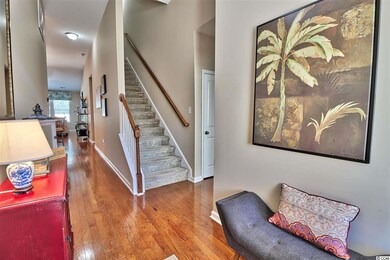 Gleaming floors greet you upon entering the home. 