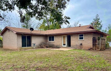 Rear view of house with a patio