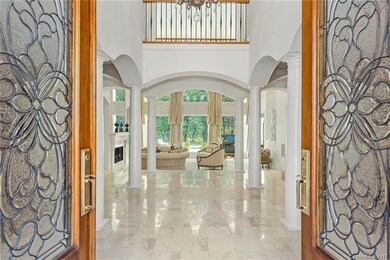 Leaded Glass Doors lead to this Timeless Entrance 