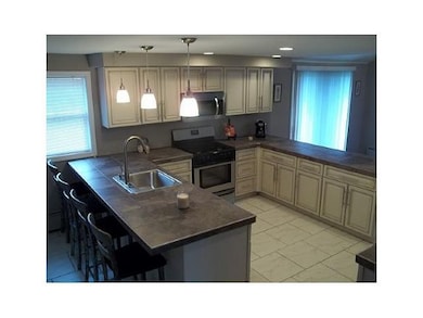Kitchen. Sanibel glazed cabinets. SS apps. Brand n