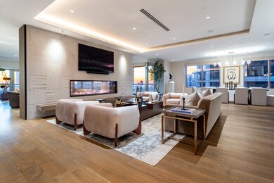 10' ceilings, indirect lighting, white oak hardwood floors, see-through fireplace.