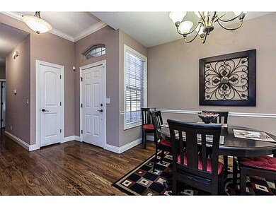 Dining Room. There is a place for another table close to the kitchen, and also a counter for bar stools.