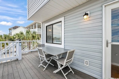 Wooden terrace with outdoor dining space
