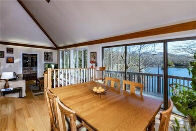Vaulted ceilings, hardwood floors and views galore
