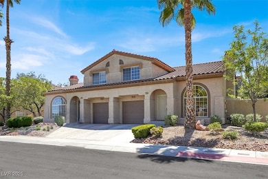 Mediterranean / spanish house featuring a tile roo