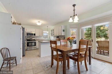 Informal dining with patio door leading to private