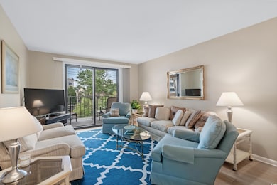 Living room featuring baseboards and wood finished