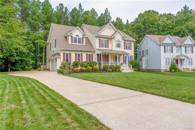 Extra wide driveway and side load two car garage.