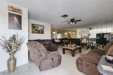 Living area with light tile patterned flooring and