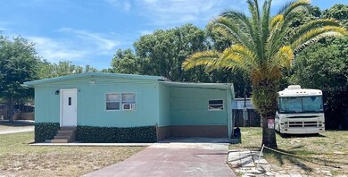 Long Driveway and covered carport