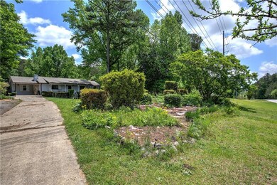 View of front of home with concrete driveway and a