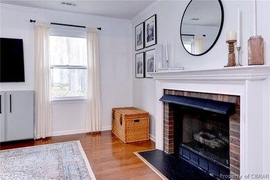 Living room featuring beautiful fireplace!