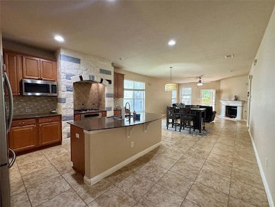 Kitchen featuring a sink, appliances with stainle