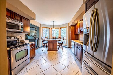 Bright and airy eat in kitchen area complete with 