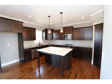 1524 Wildwood Cir, Raymore, MO 64083 - photo 2