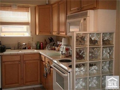 tile counters- upgraded cabinets a few yrs ago