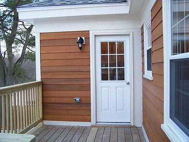 Exterior Back. Back door goes into...