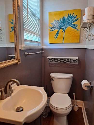 Bathroom with a sink and toilet
