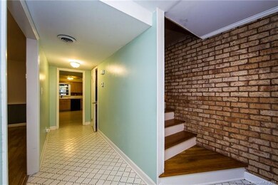 View of stairs to second floor. Nice hardwood floo