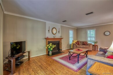FAMILY ROOM WITH WOOD BURNING FP